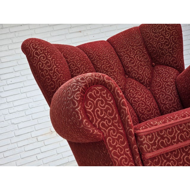 1960s, Danish relax armchair. Original red furniture wool, oak wood legs, brass springs in the seat. Original good...