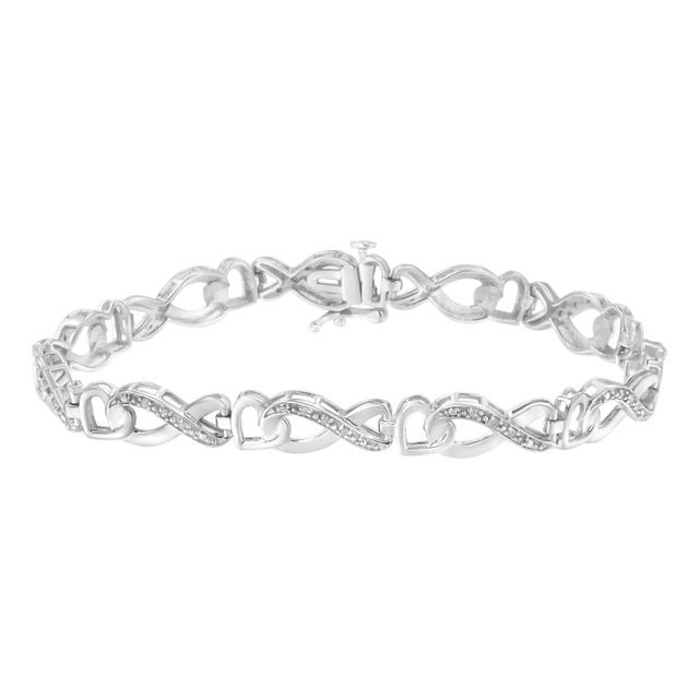 .925 Sterling Silver 1/5 Cttw Diamond 7 Infinity Heart Tennis Bracelet (H-I Color, I2-I3 Clarity) For Sale