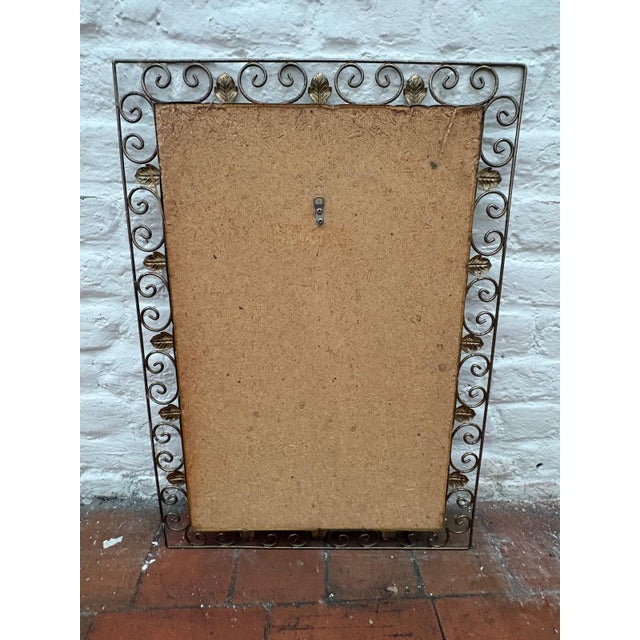 Rectangular mirror from the 1950s-60s on a brass frame