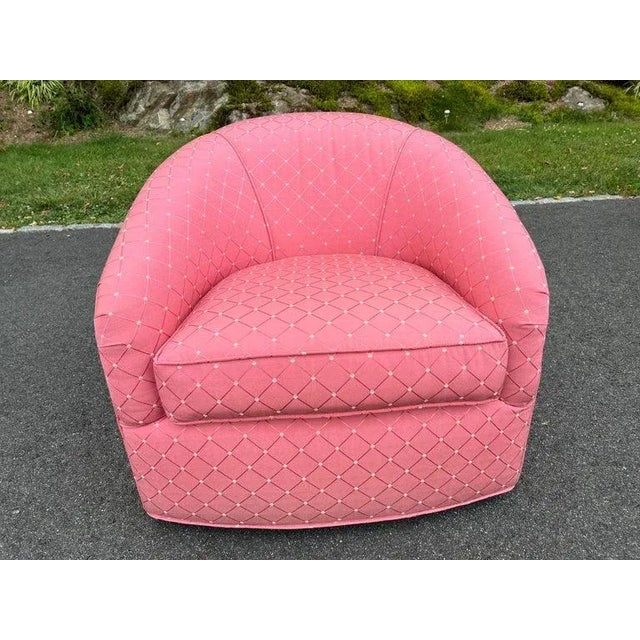 Pretty in pink barrel swivel chair. Super comfortable with classic lines and low profile. Use as is or recover if desired....