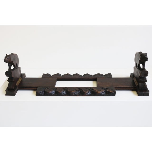 Gorgeous 19th century antique Black Forest Extendable bookshelf hand carved from Switzerland. Lovely carved bears by a...