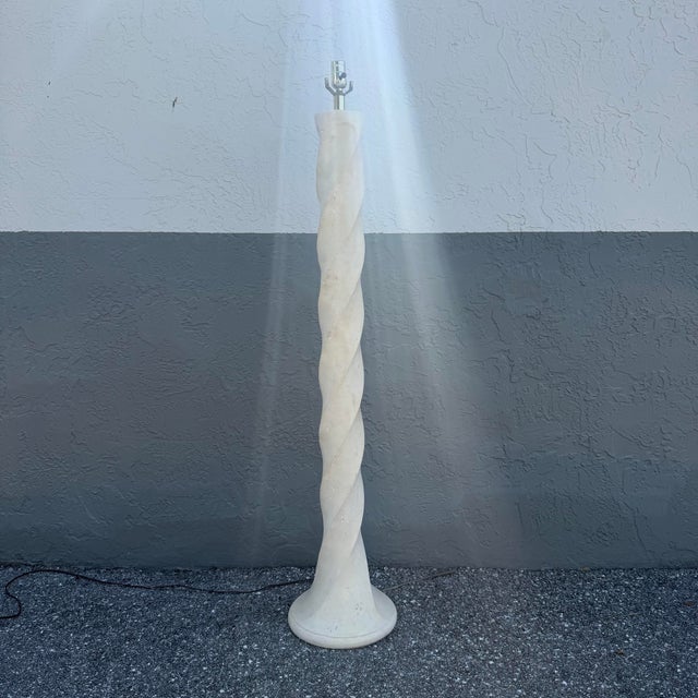 This striking Postmodern floor lamp features a sculptural twisted column finished in textured cream plaster, blending bold...