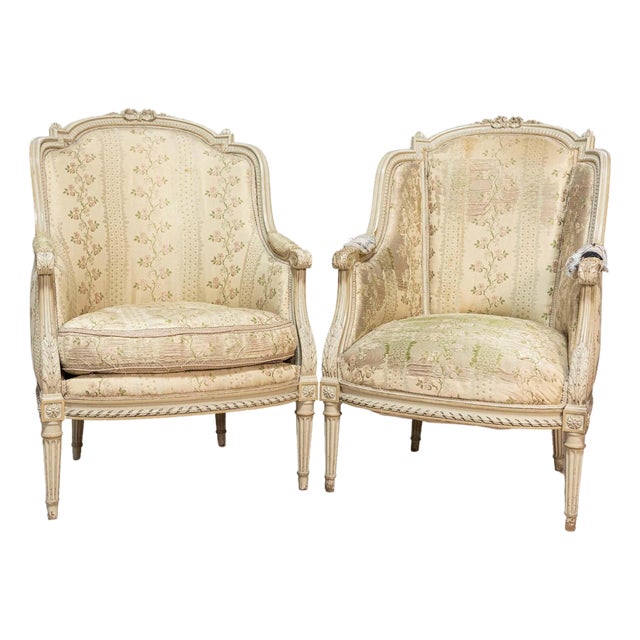Pair of French Louis XVI Style 1900s Painted and Carved Bergères à Oreilles For Sale