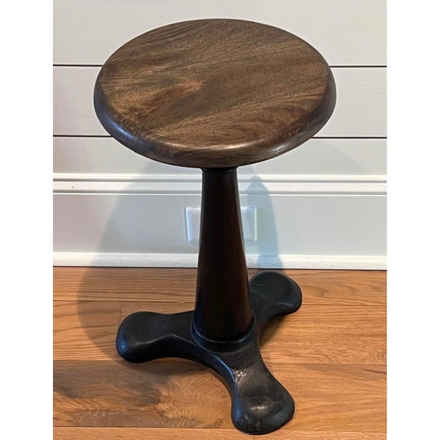 Beautiful Restoration Hardware side table with cast iron base and solid reclaimed wooden top. Can also be used as a stool....