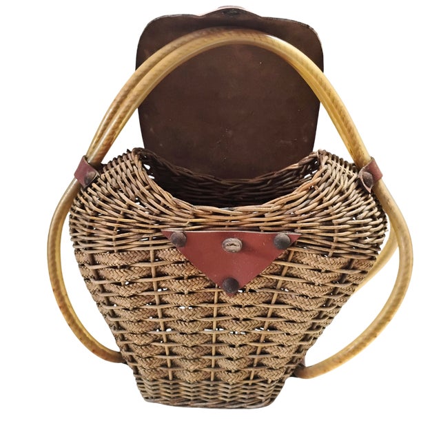 One-of-a-kind handmade basket handbag. Features a gorgeous, authentic age-earned patina and structural rust on the metal...