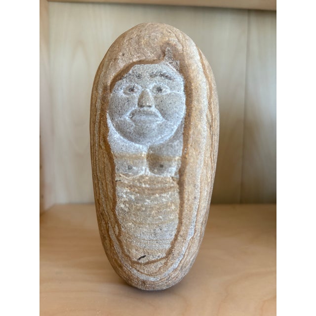 Incredible hand-carved stone sculpture of a woman. Likely made from sandstone or river stone. Very old, possibly Inuit...