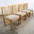 Handsome set of 6 blonde dining chairs in solid wood. The fabric is an oatmeal tweed and is in great shape.. The legs and...