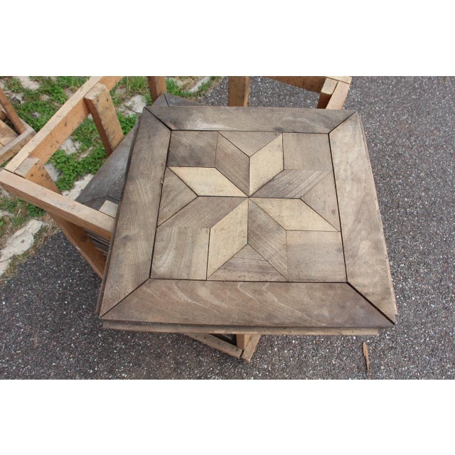 Set of 70 solid wood parquet floor tiles (40 cm x 40 cm) composed of walnut, beech, and cherry. Work from the second half...