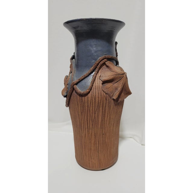 Organic, Contemporary Vase, resembling Art Nouveau Style. Red clay with blue matte glaze above. Body textured to resemble...