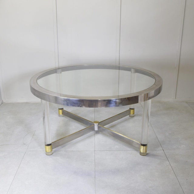 A round table by Sandro Petti for Metalarte, produced in the 1970s. The round table features a brushed steel top. The legs...