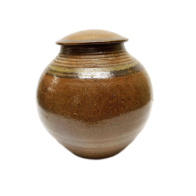 This gorgeous studio pottery stoneware salt-glaze covered moon jar by S. Bernhardt is a masterful blend of artistry and...