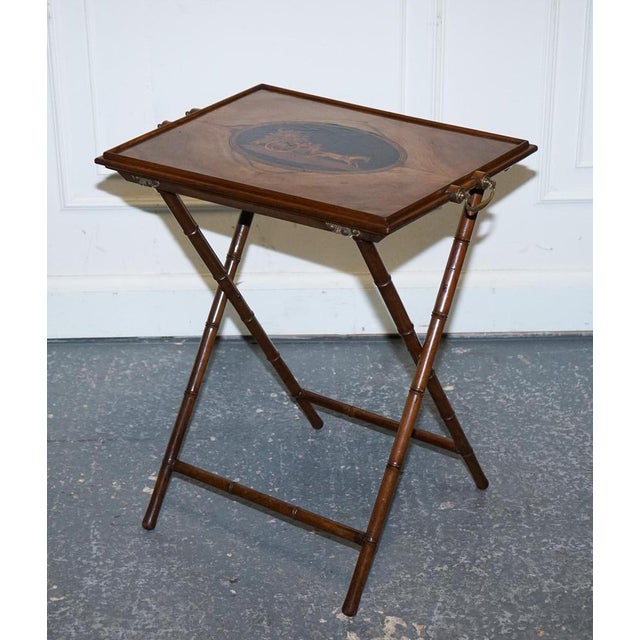 A Stunning Victorian Double-Sided Serving Tray. Elegantly resting on a stylish bamboo stand. This exquisite piece features...