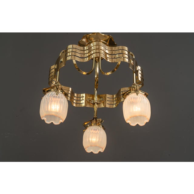 Jugendstil Chandelier with opaline glass shades vienna around 1910 Brass polished and stove enameled Original opline glass...