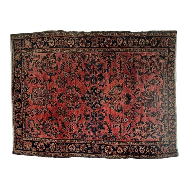 This is an Authentic wool pile genuine hand made antique Persian Sarouk-