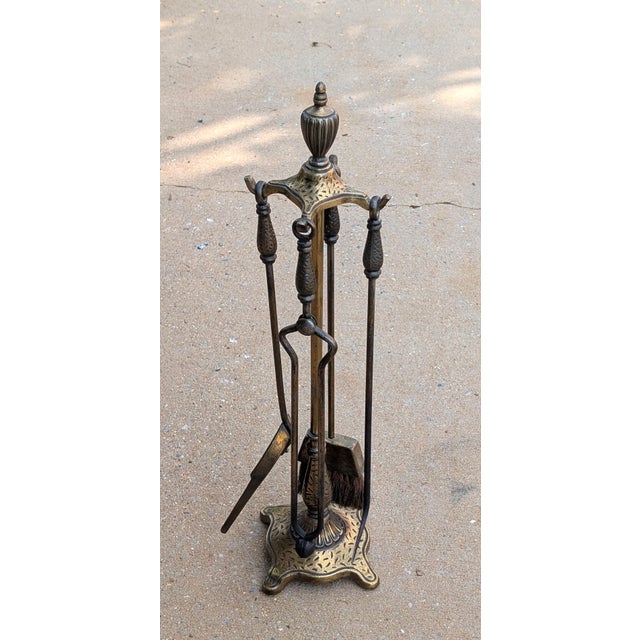 Elevate your hearth with this magnificent vintage Victorian four-piece fireplace tool set, masterfully hand-crafted in...