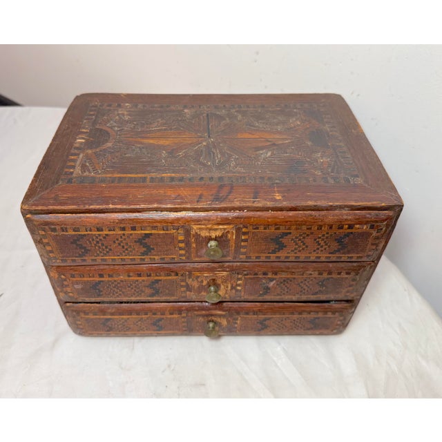 This antique 19th century handmade marquetry wood and brass jewelry chest is a unique piece and very well made. With a...