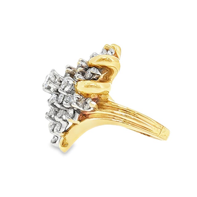 A late 20th-century cluster cocktail ring crafted in 14k gold, featuring approximately 2.5 carats of brilliant-cut...