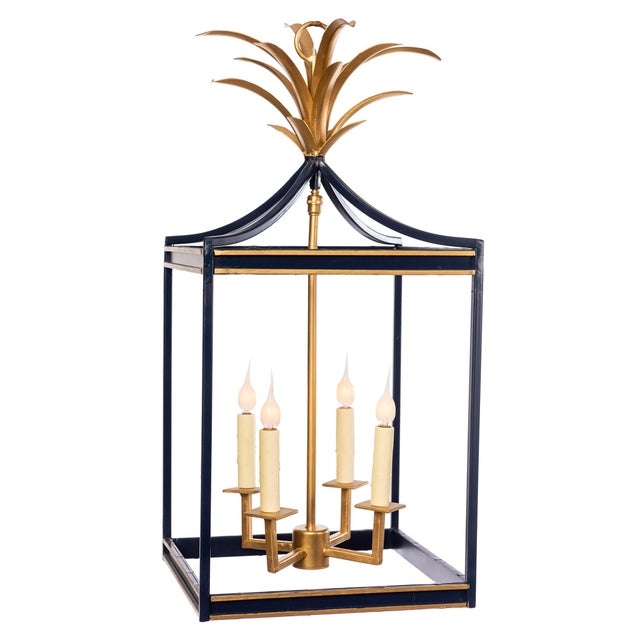 The exquisite classic lantern style of the Majestic Palm Lantern boasts dramatic hand-forged steel palm leaves with...