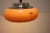 Big pendant by Meblo, Italy, 1970's. Beige-orange plastic shade, in good condition overall, only some minor scratches from...