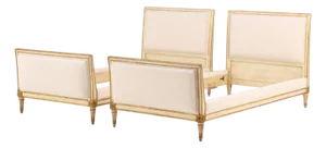 A Pair of French Louis XVI Style Painted and Gilt Twin Beds, C. 1940.