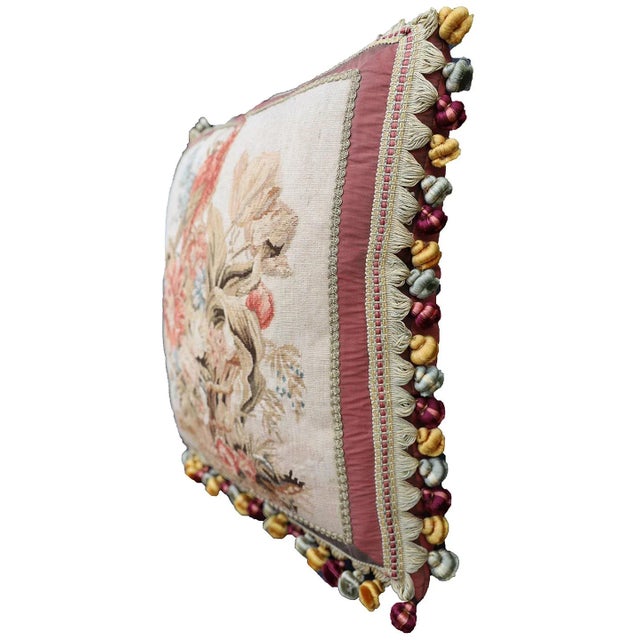 This is a beautiful hand-woven silk and wool tapestry pillow. It was made by Ariana Rugs in the early 2000s with the...