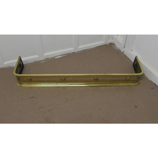 Victorian Arts & Crafts pierced brass fender This is a very superior quality Victorian pierced brass fender it has...