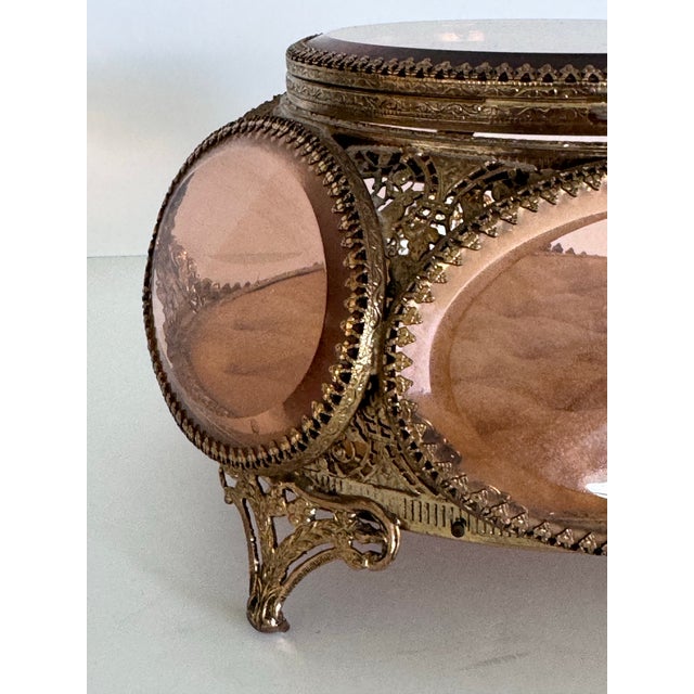 Add a touch of vintage glamour to your vanity or dressing table with this beautiful 1960s ormolu jewelry casket. Featuring...