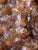 A monumental natural red rutilated quartz specimen selected for its sculptural scale, earthy ochre coloration, and raw...