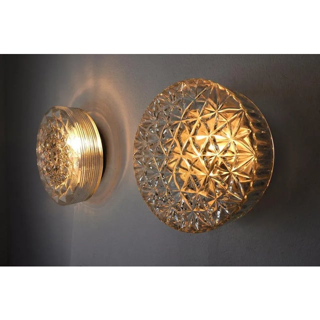Very nice duo of glass sconces designed and produced by peris andreu in spain in the 1970s. The two sconces are made of a...