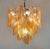 DUTIES FREE Elegant and sculptural Italian Murano glass chandelier attributed to Mazzega, crafted during the late 20th...