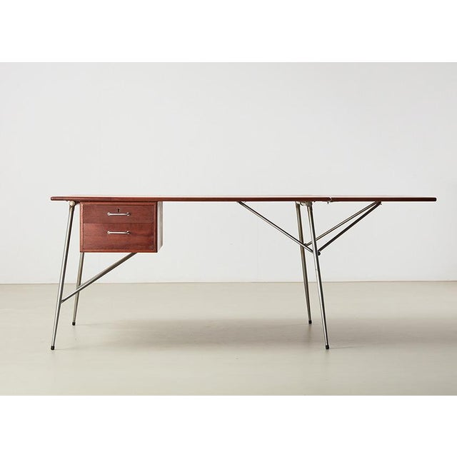 Beautiful minimalist drop leaf desk, designed by the renowned designer Borge Mogensen in 1953 for Soborg Denmark. This...