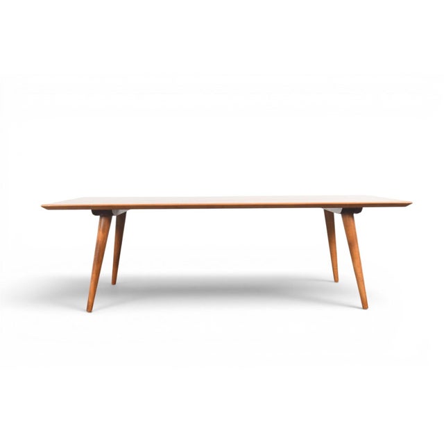This bench, doubling as a coffee table, is from Paul McCobb's Planner Group line, produced by Winchendon Furniture Company...