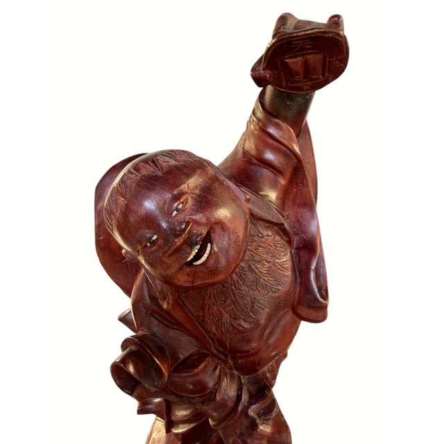 Vintage Chinese hand-carved hardwood sculpture depicting a jovial Daoist figure, believed to represent Liu Hai (Liu...