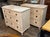This product is a pair of Swedish Neo-Classical style bedside tables, that are hand painted in a white patina. These...