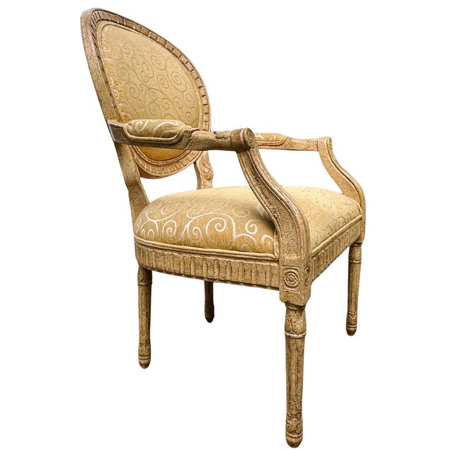 This French Louis XVI style fauteuil is a beautiful example of late 18th-century neoclassical design, reflecting the style...