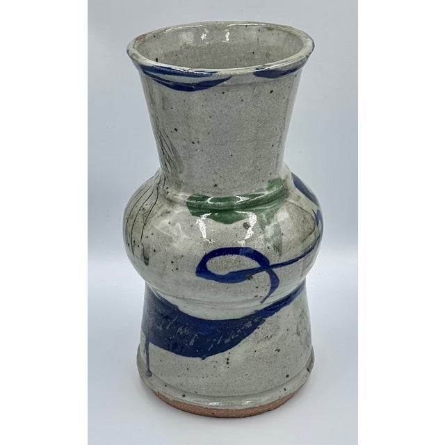 Discover this exquisite Mid-Century Salt Glazed Stoneware Studio Art Pottery Vase, a true testament to artisanal...
