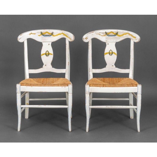Pair of American White Paint-Decorated Rush Seat Chairs. 37" H x 23" W x 21" D; seat: 19" H. Provenance: From a New York...