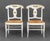Pair of American White Paint-Decorated Rush Seat Chairs. 37" H x 23" W x 21" D; seat: 19" H. Provenance: From a New York...