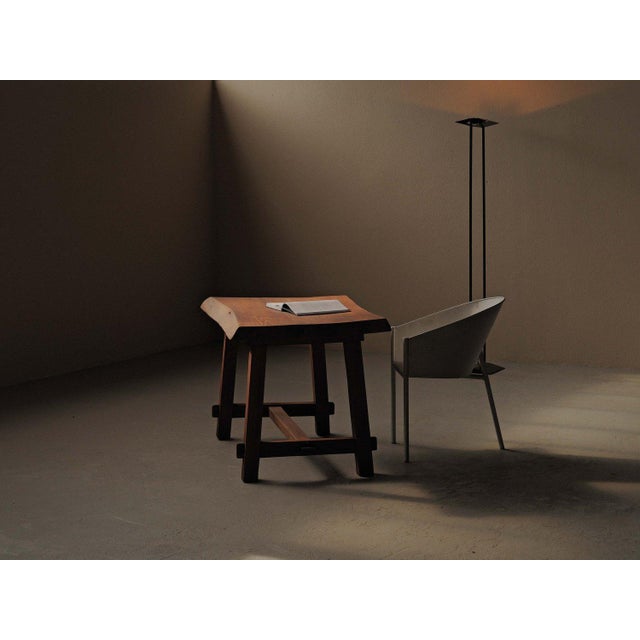 Solid oak table was crafted in France in the 1970s and can function equally well as a desk or side table. The thick top,...