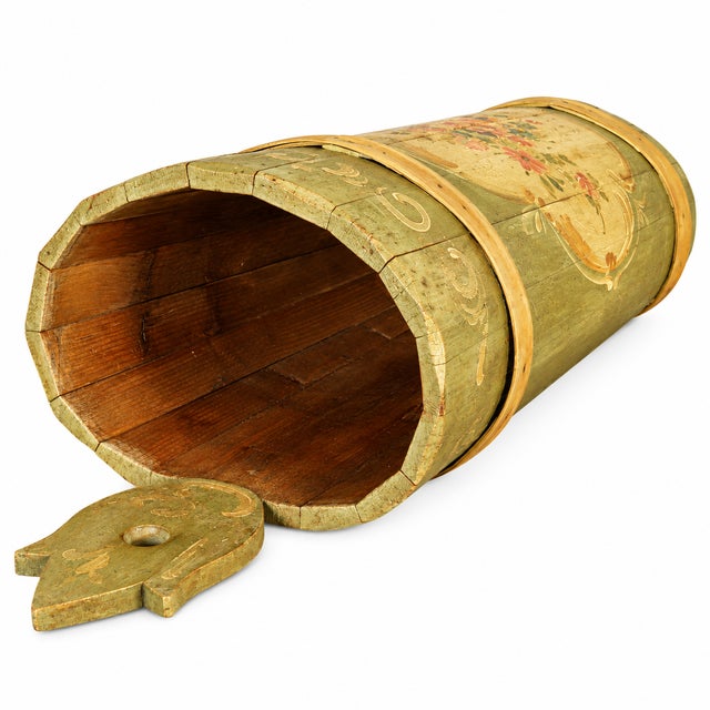 Charming antique hand-painted wooden container from the historic hotel posta in cortina d’ampezzo, characterized by an...