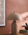 Illuminate your space with the Elder accent table lamp, a striking blend of industrial rustic charm that will captivate...
