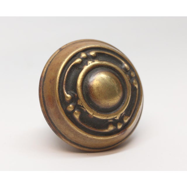 This Victorian style four fold door knob was made by Norwalk in the 1926 catalog. It is part of the H-60100 Clinton group....
