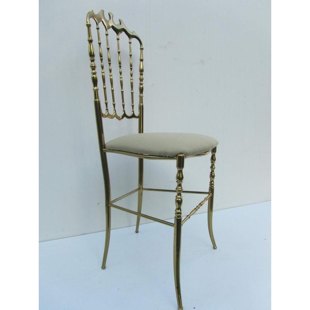 Decorative golden brass Italian design side chair by Giuseppe Gaetano Descalzi for Chiavari, Italy The chair dates back to...