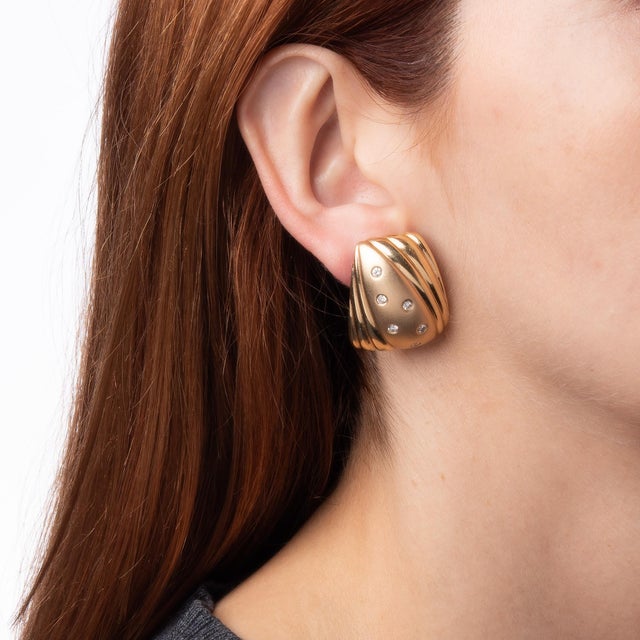 This is part of Chairish’s Fine Jewelry assortment. Stylish pair of large vintage diamond earrings crafted in 14k yellow...