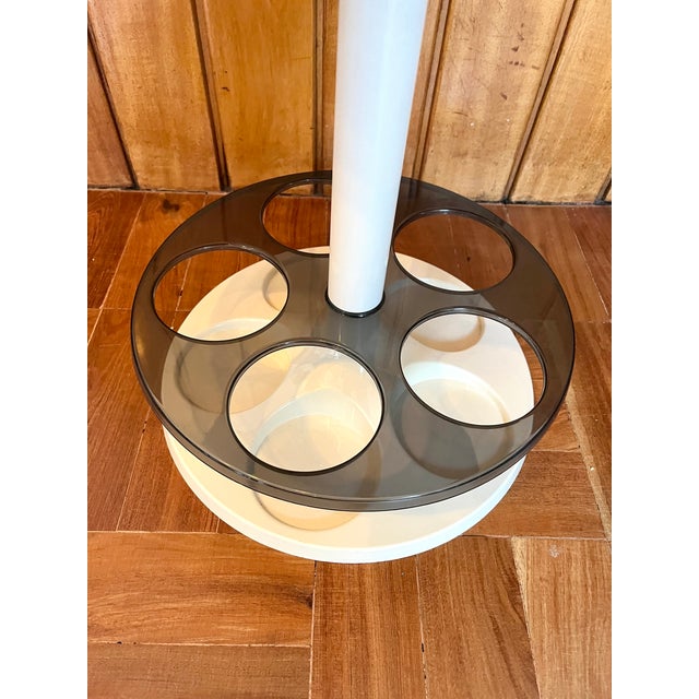 Vintage bottle holder and bar stand designed and produced by Flair in the Netherlands during the 1970s. This elegant space...