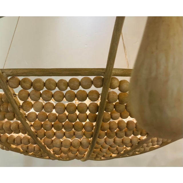 Currey & Company Currey & Company Organic Modern Wood Bead Korg Chandelier For Sale - Image 4 of 7