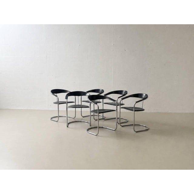 An elegant set of six canasta cantilever chairs from the italian manufacturer arrben, dating from the 1980s. These chairs...