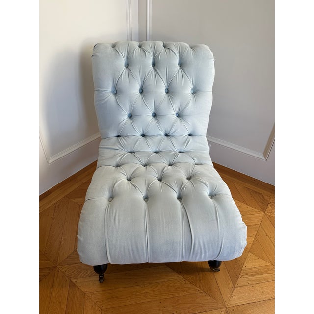 These tufted slipper chairs are upholstered in a light blue microfiber fabric. They are a versatile set that are an eye...