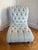These tufted slipper chairs are upholstered in a light blue microfiber fabric. They are a versatile set that are an eye...