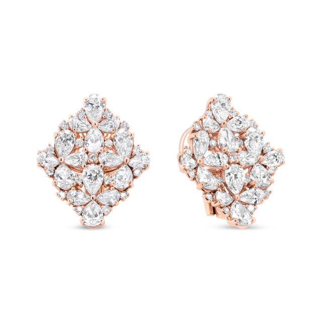 These bold earrings dazzle with a wow-factor like none other! A shimmering collection of diamonds sparkle from all over...